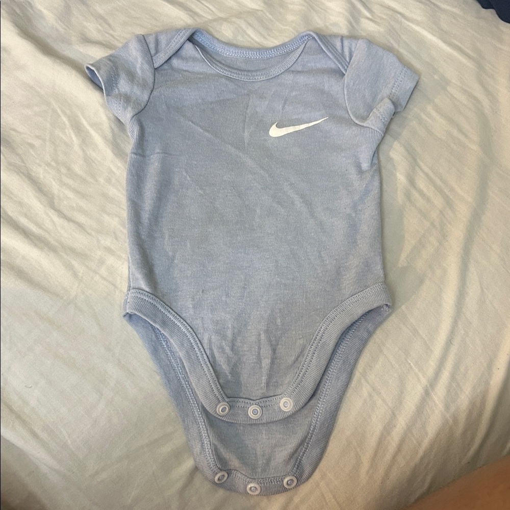 Nike Light Blue Baby Bodysuit